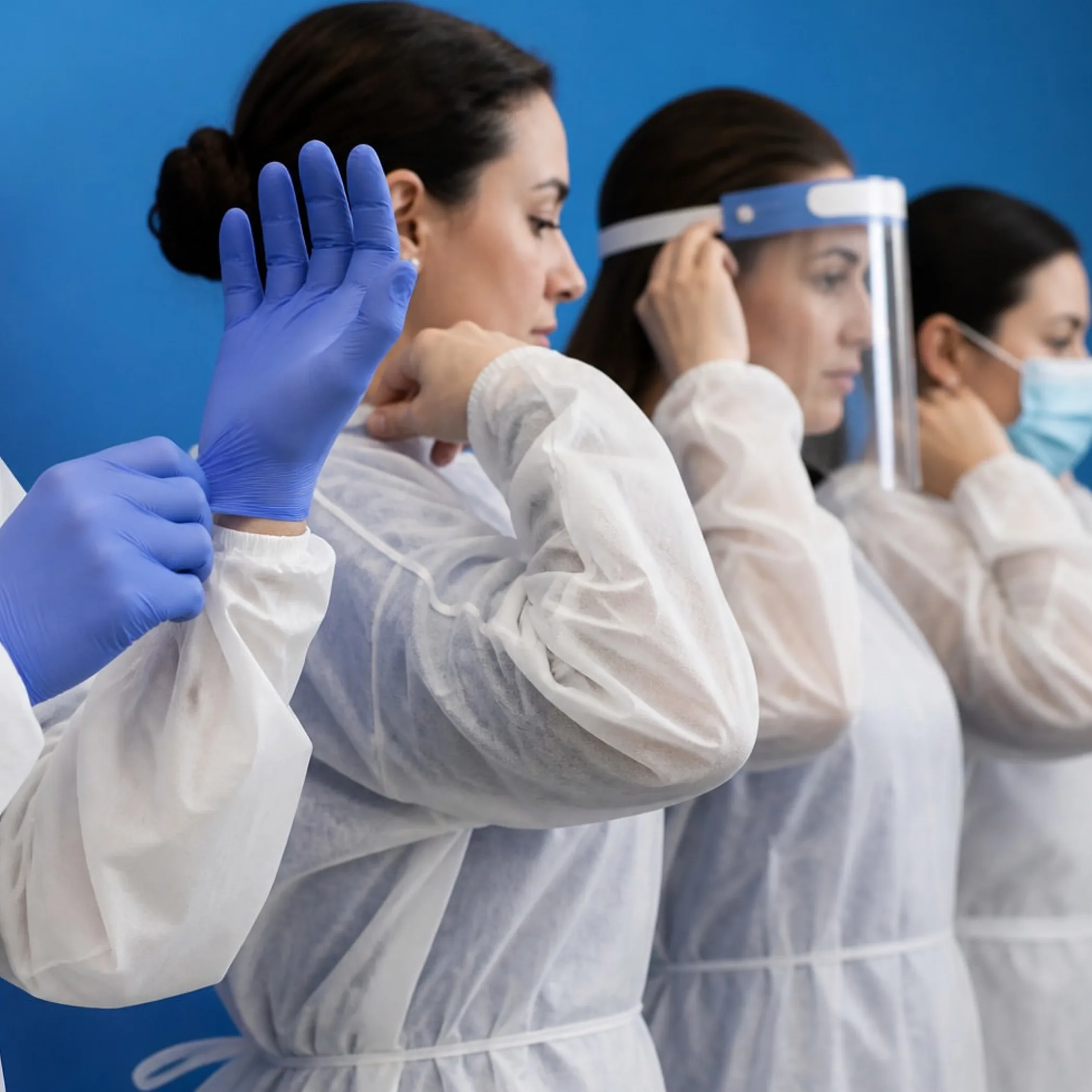 person wearing infection control ppe