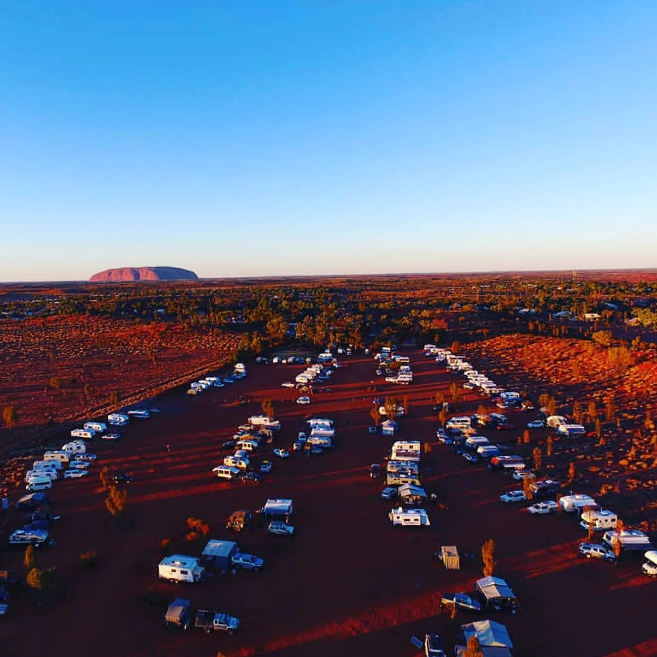 uluru area with campers clear sky